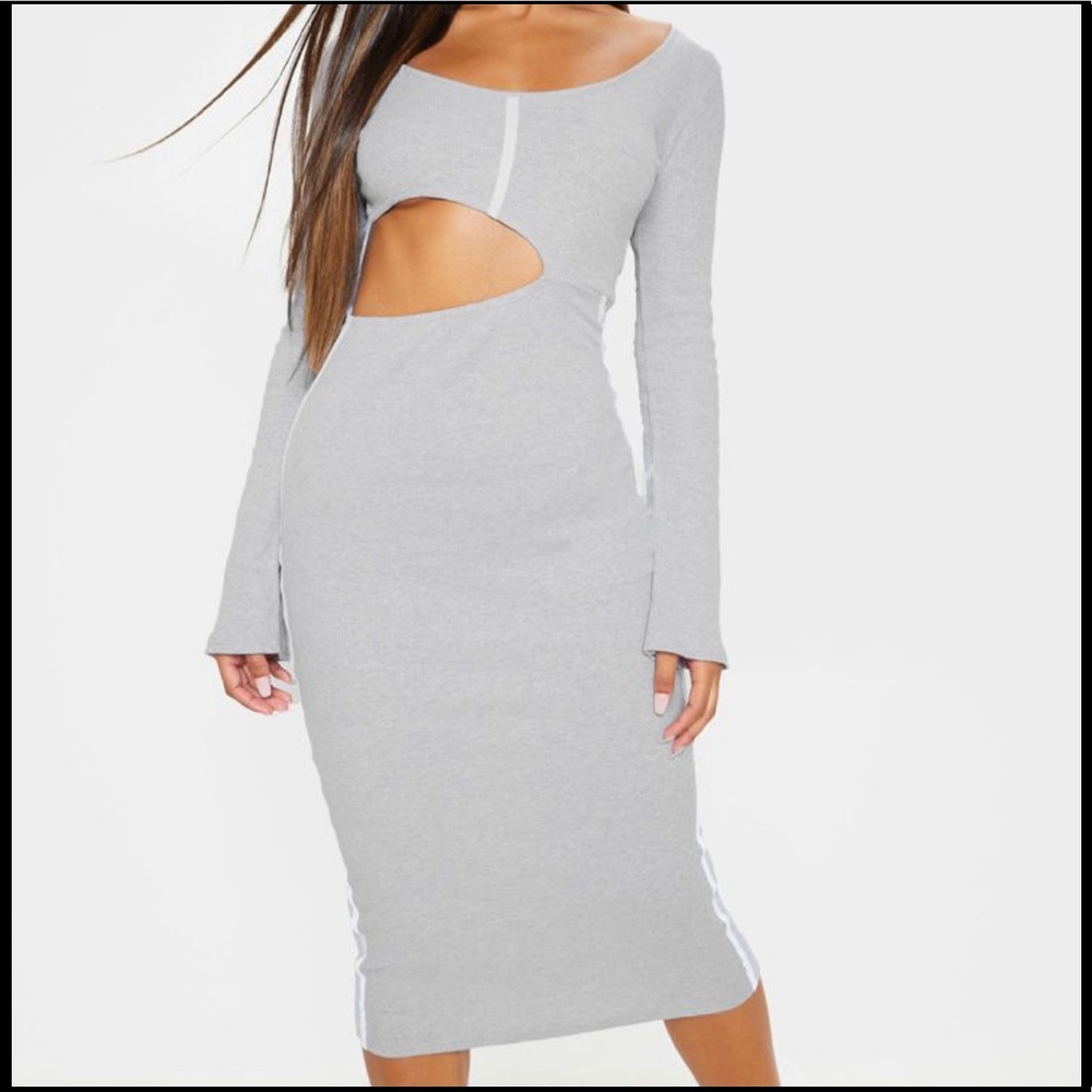 Grey dress with white lines on chest & sides